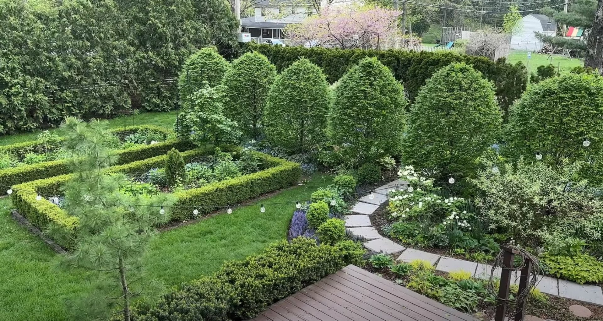 Formal Garden Installation - Geometric Design with Pathway Lighting Formal garden design with geometric lawn patterns, hedged borders, and pathway lighting